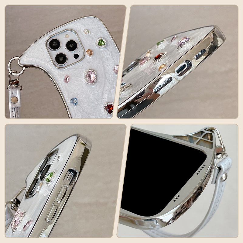 Etui na iPhone'a z regulowanym paskiem na rękę